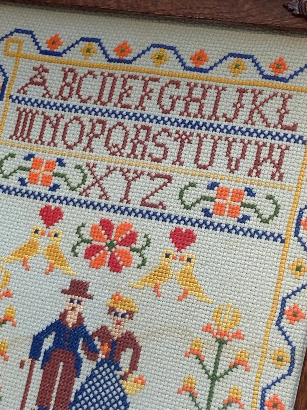 Vintage Framed Cross Stitch Sampler With Alphabet Flowers Birds And Couple